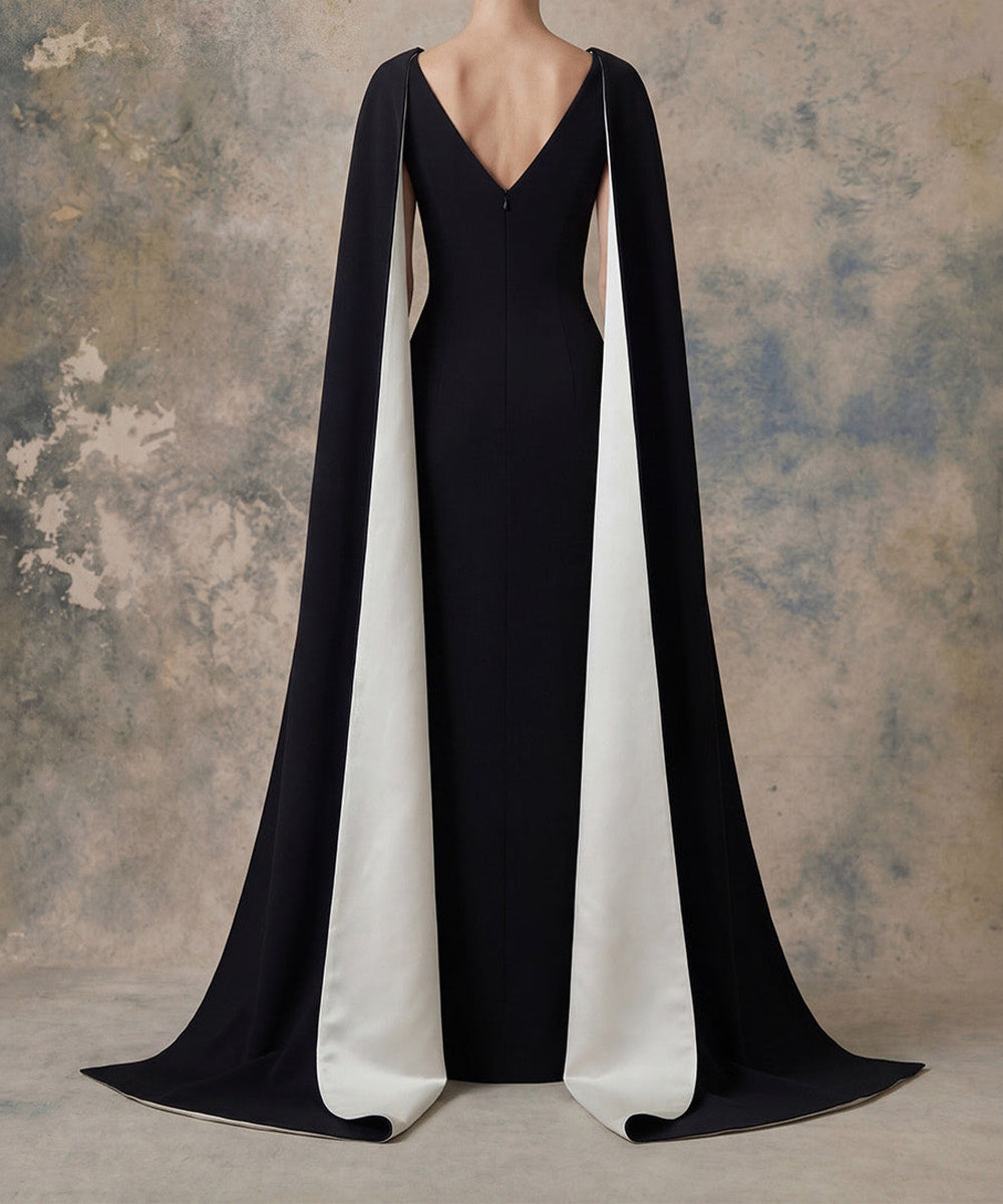 Black Crepe Sheath Gown With Contrast White Lined Cape Sleeves