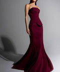 Strapless Burgundy Mermaid Formal Evening Gown With Peplum Detail