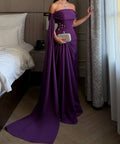 Purple Off‑the‑Shoulder Draped Cape Sleeve Mermaid Evening Gown With Floral Rhinestone Details